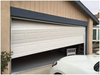 Steps to Repair a Garage Door image Steps to Repair a Garage Door
