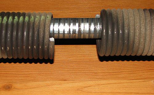 Ressort pour porte de garage sectionnelle - Type D